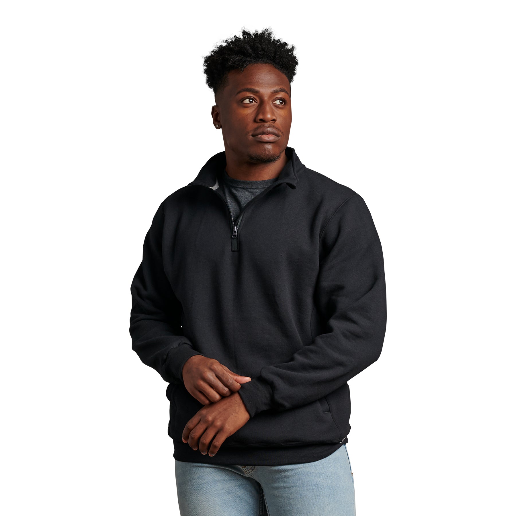 A Black Russell Athletic DRI-POWER Fleece Quarter-Zip Cadet worn by a man looking to the side.