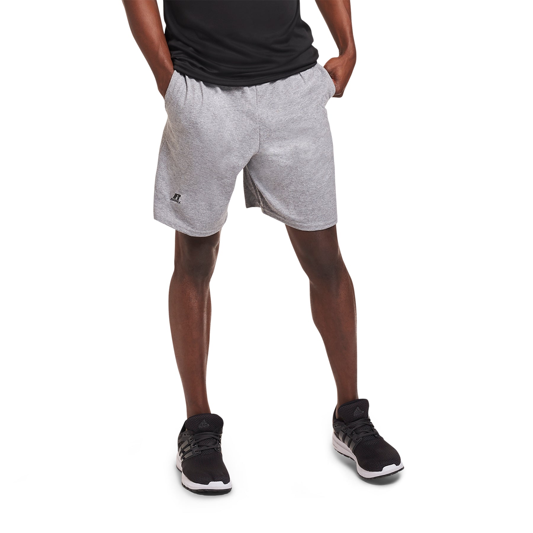 Russell Athletic Cotton Jersey Pocketed Short in Oxford gray worn by a model with black athletic shoes.