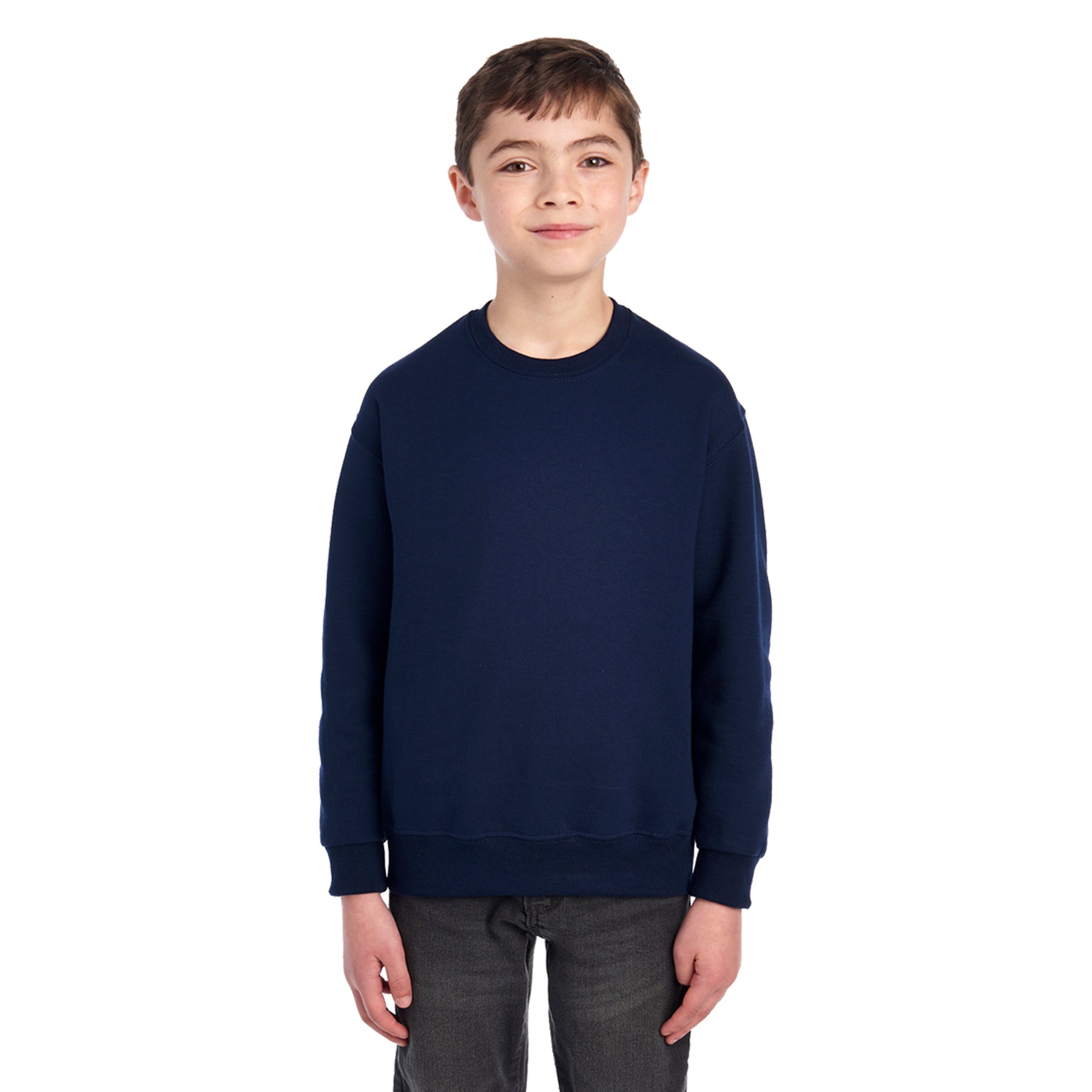 A young boy wearing a Jerzees NuBlend® Youth Sweatshirt in J. Navy blue.