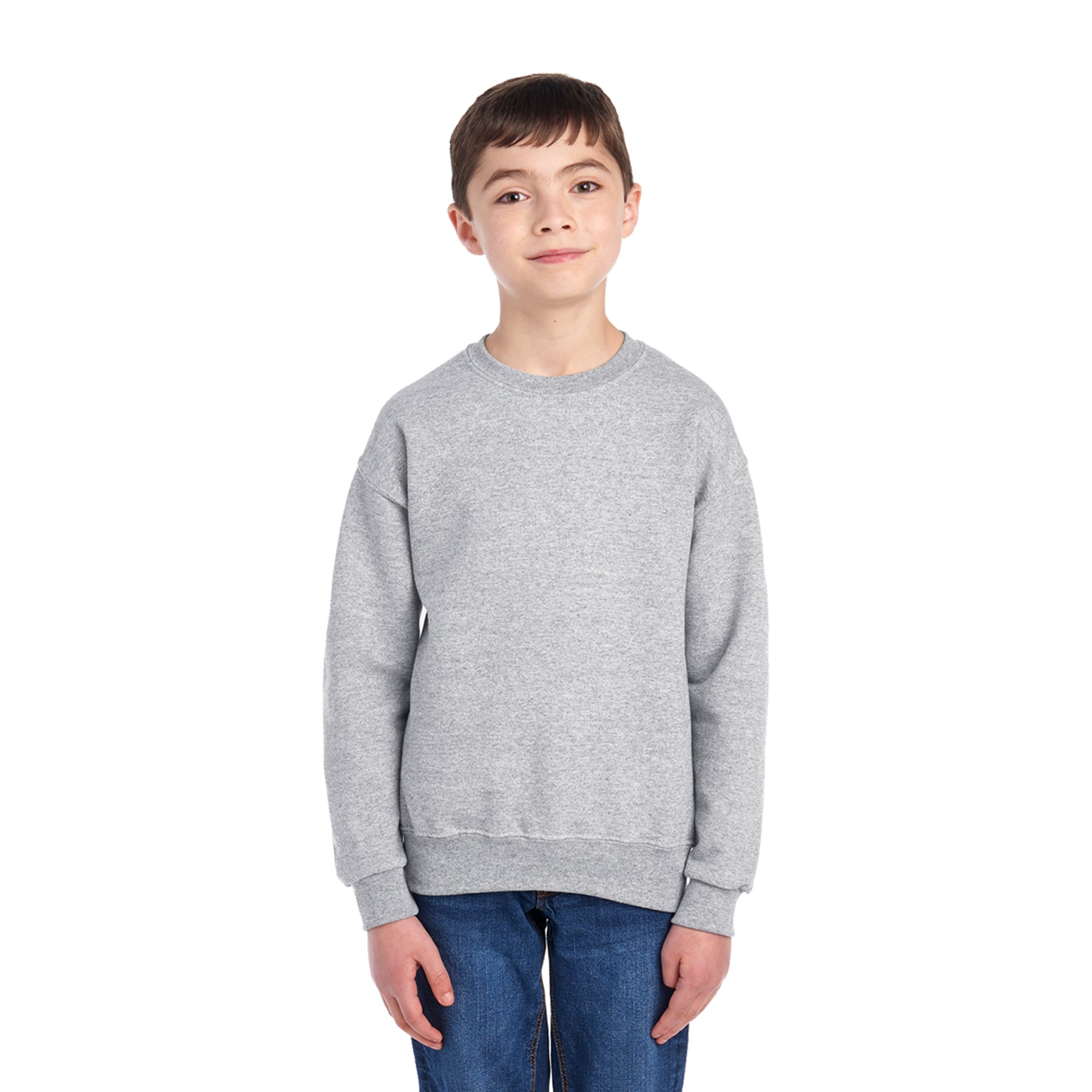 Young boy wearing a grey Jerzees NuBlend® Youth Sweatshirt in Oxford color against a white background.