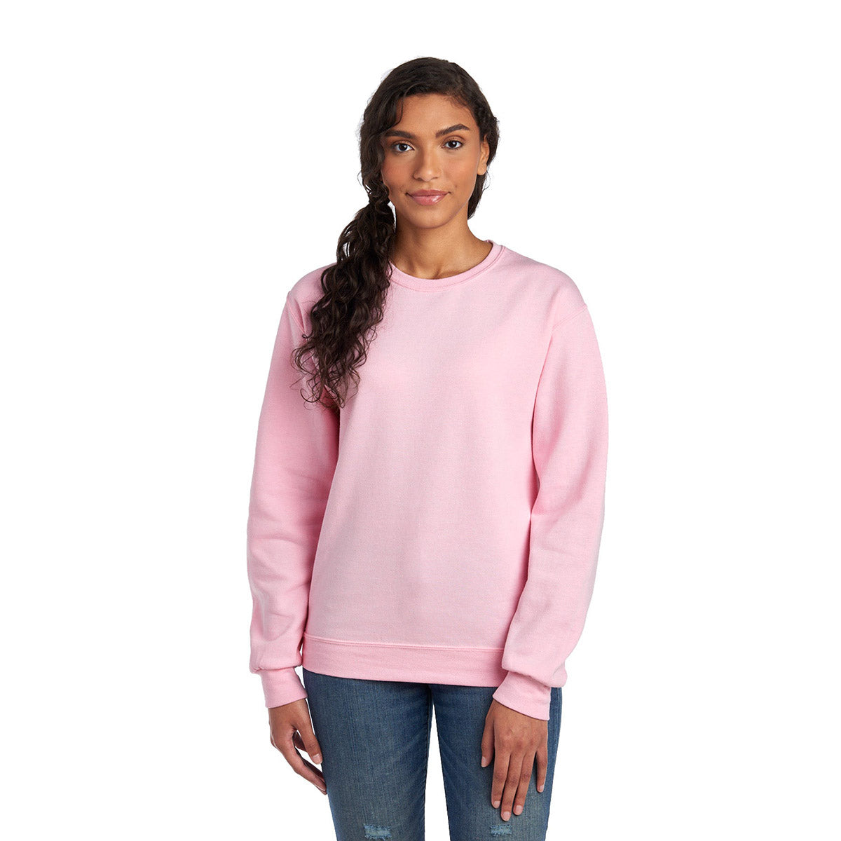 A model wearing a Jerzees NuBlend® Adult Sweatshirt in Classic Pink.