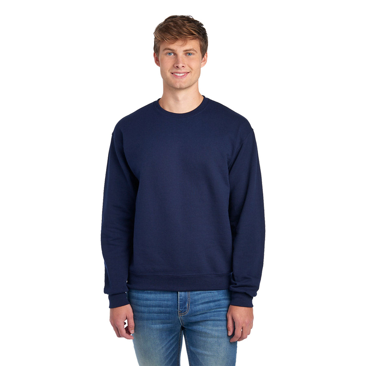 A young man wearing a J. Navy Jerzees NuBlend® Adult Sweatshirt.