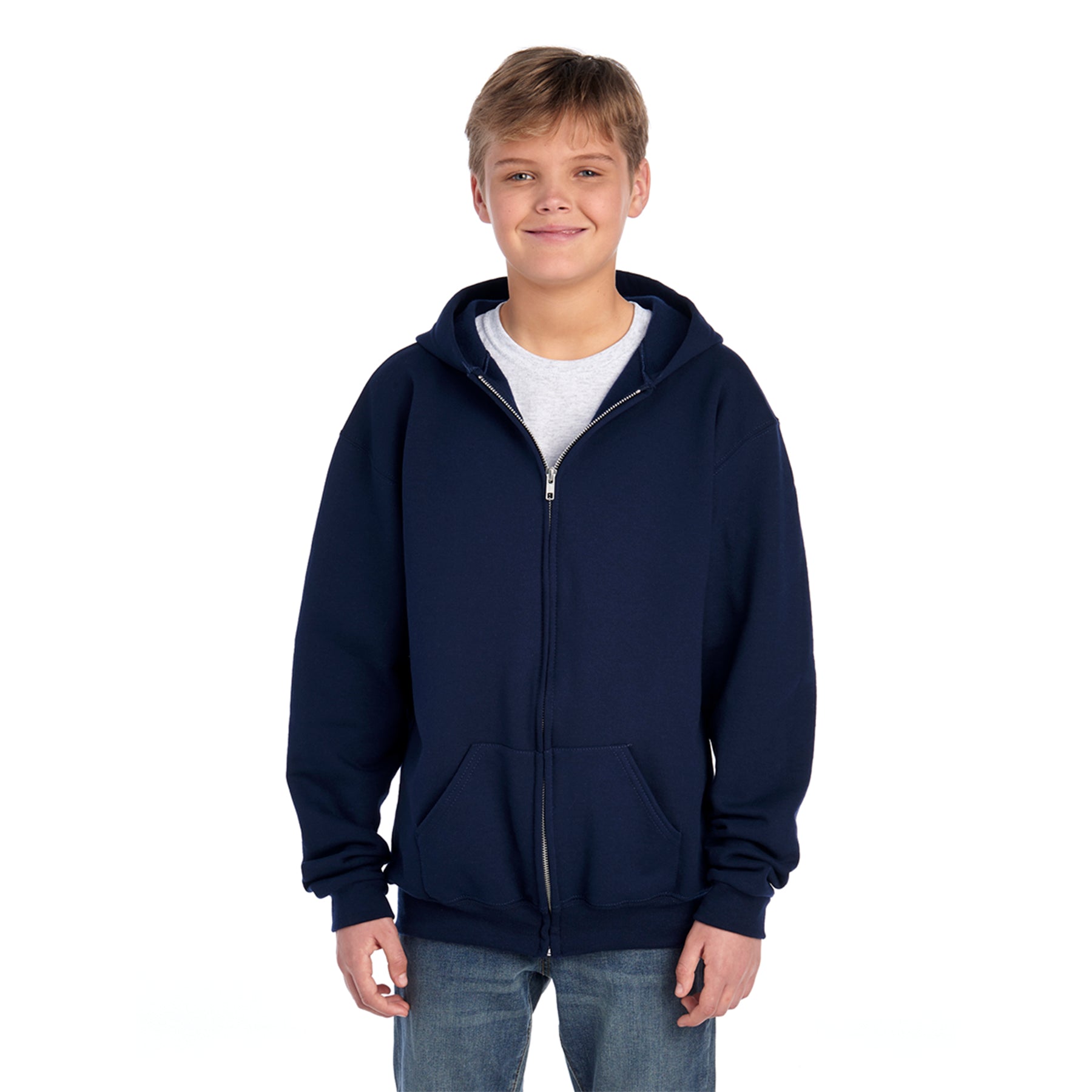 Youth model wearing a navy blue Jerzees NuBlend® full-zip hooded sweatshirt over a grey t-shirt and jeans.