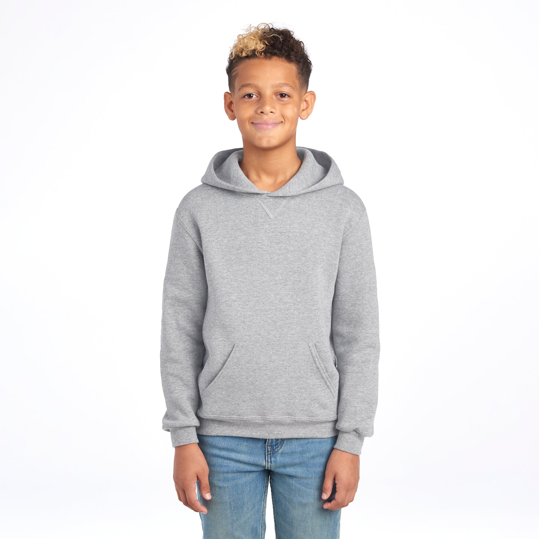 A boy wearing a grey Oxford Russell Athletic DRI-POWER Youth Fleece Pullover Hoodie.