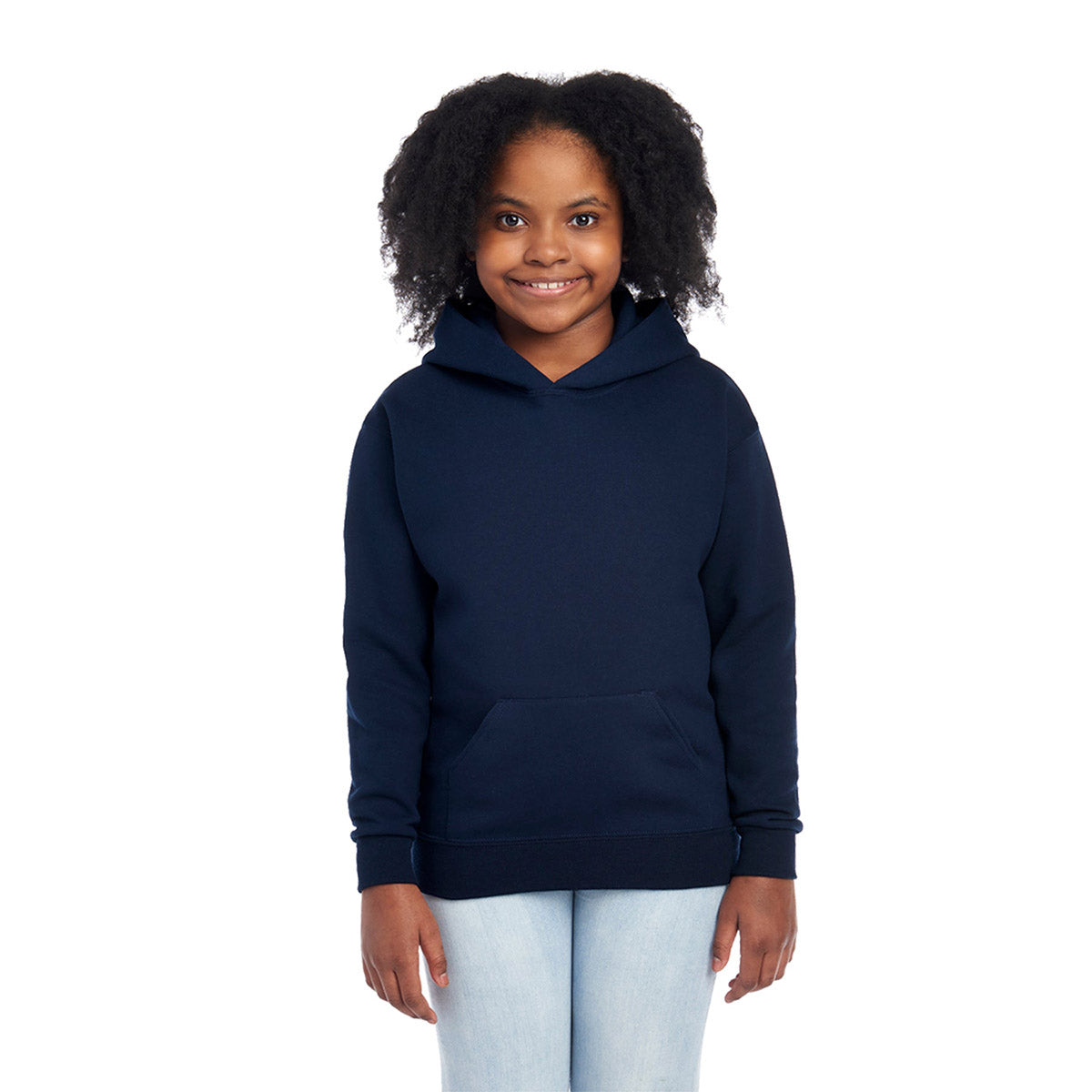 A young girl wearing a dark navy Jerzees NuBlend Youth Hooded Sweatshirt against a white background.