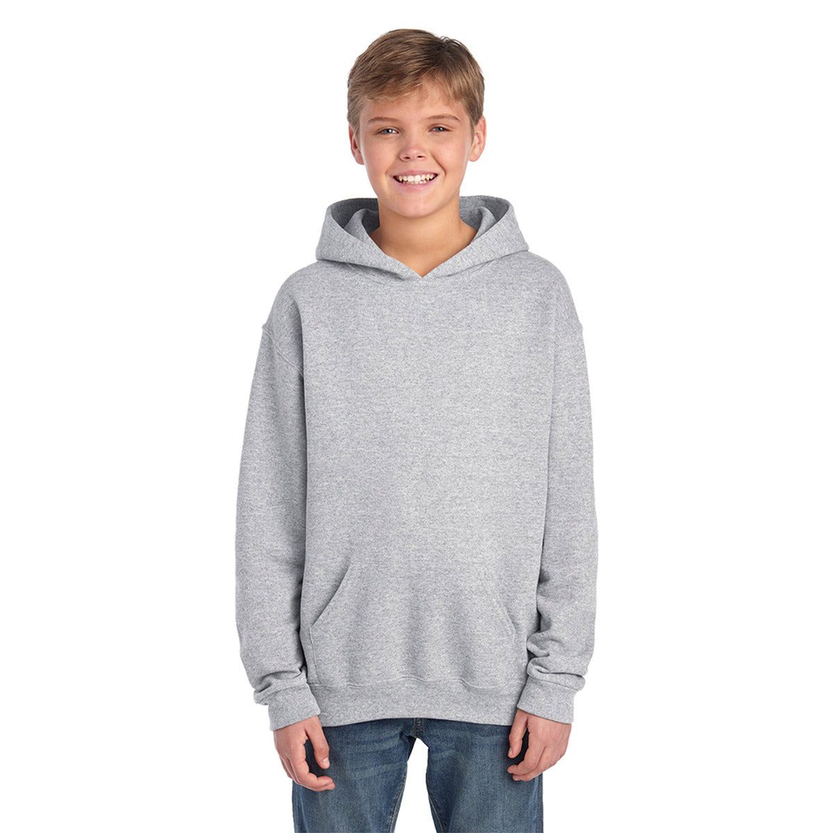 A young boy wearing a Jerzees NuBlend Youth Hooded Sweatshirt in heathered Oxford gray.