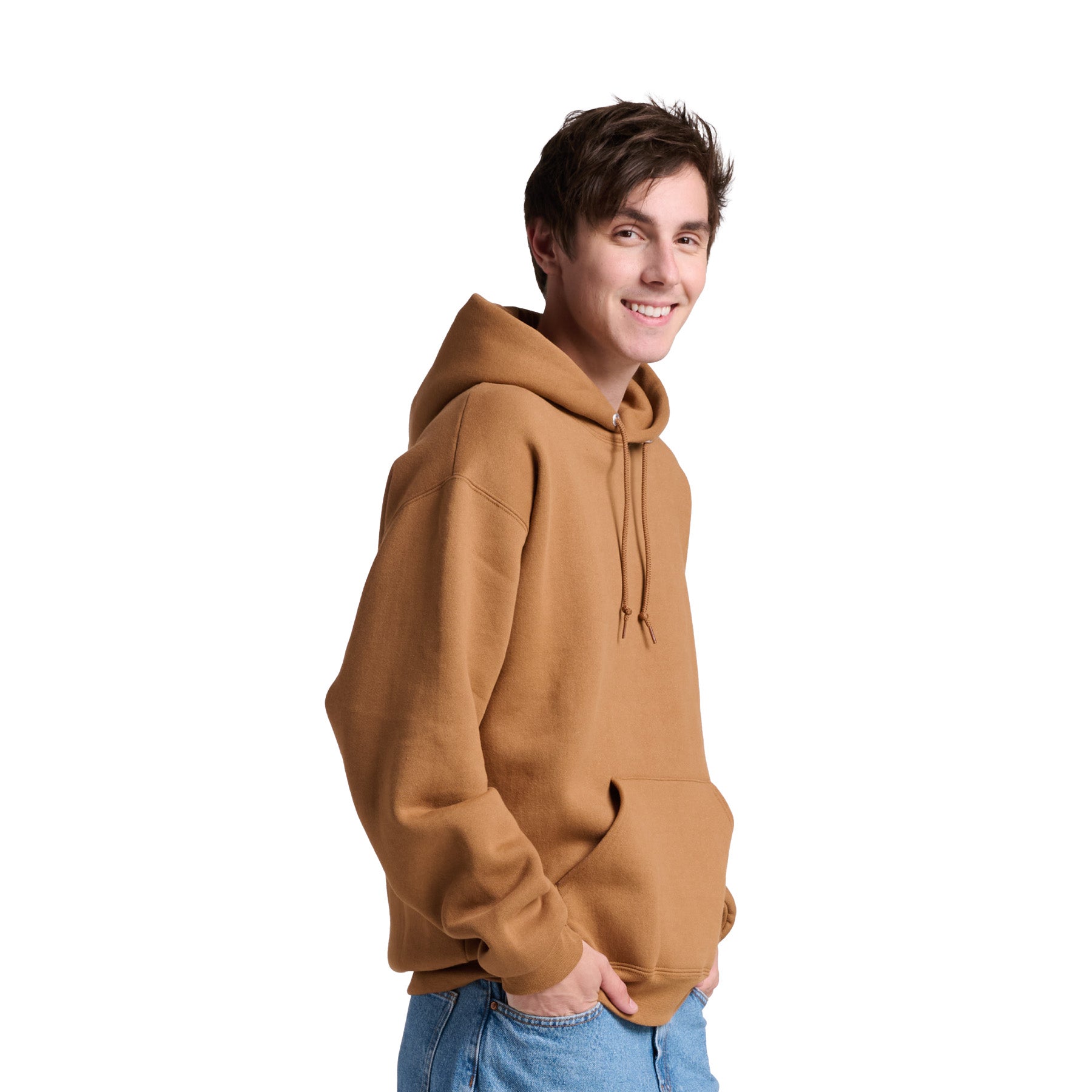 Young man wearing a Jerzees Rugged Unisex Hooded Sweatshirt in Golden Pecan, shown from a side profile.
