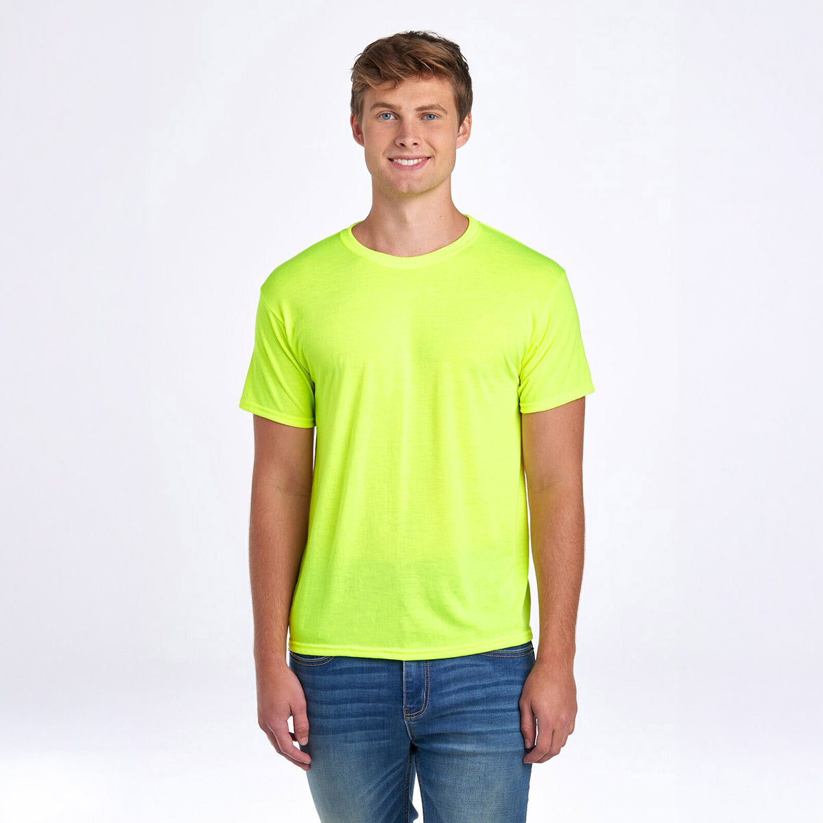 A smiling man wearing a Jerzees Dri-Power Unisex T-Shirt in Safety Green.