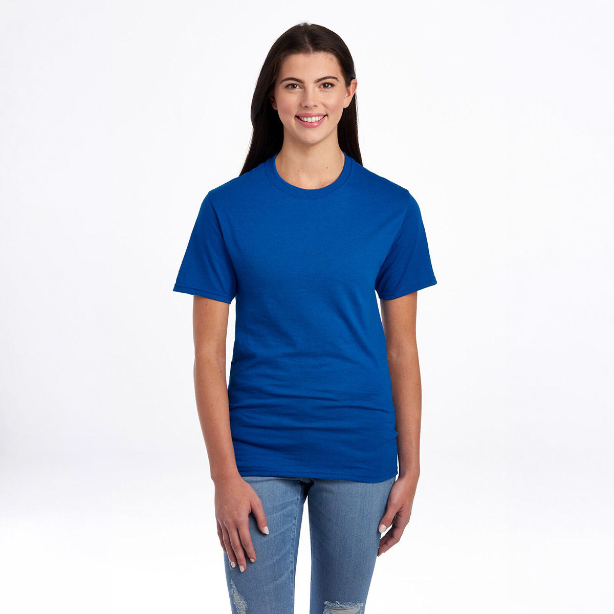 A woman wearing a royal blue Jerzees Dri-Power unisex T-shirt against a white background.