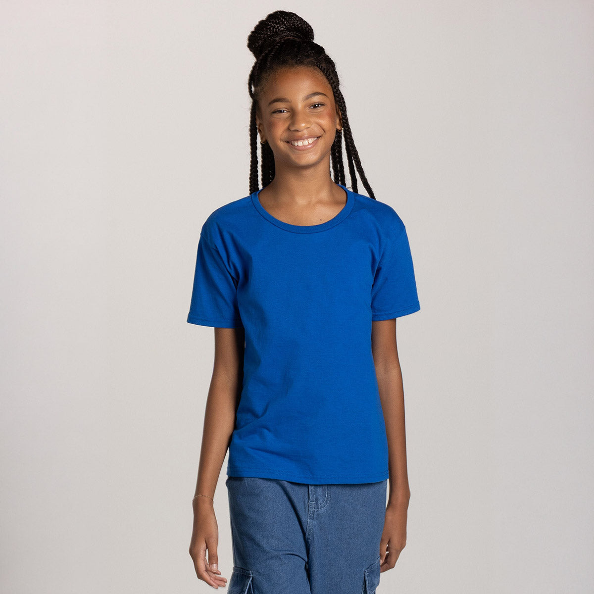 Young girl wearing a Royal blue Jerzees Classics Youth T-Shirt.