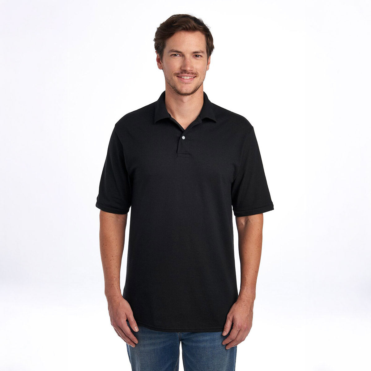 A man modeling a black Jerzees Dri-Power Sport Shirt with a polo collar and short sleeves against a white background.