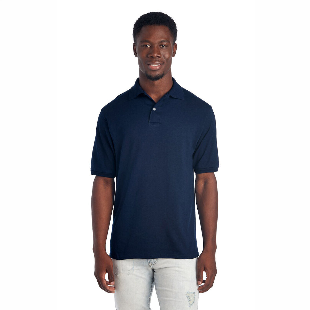 Model wearing a Jerzees Dri-Power Sport Shirt in J. Navy color against a white background.