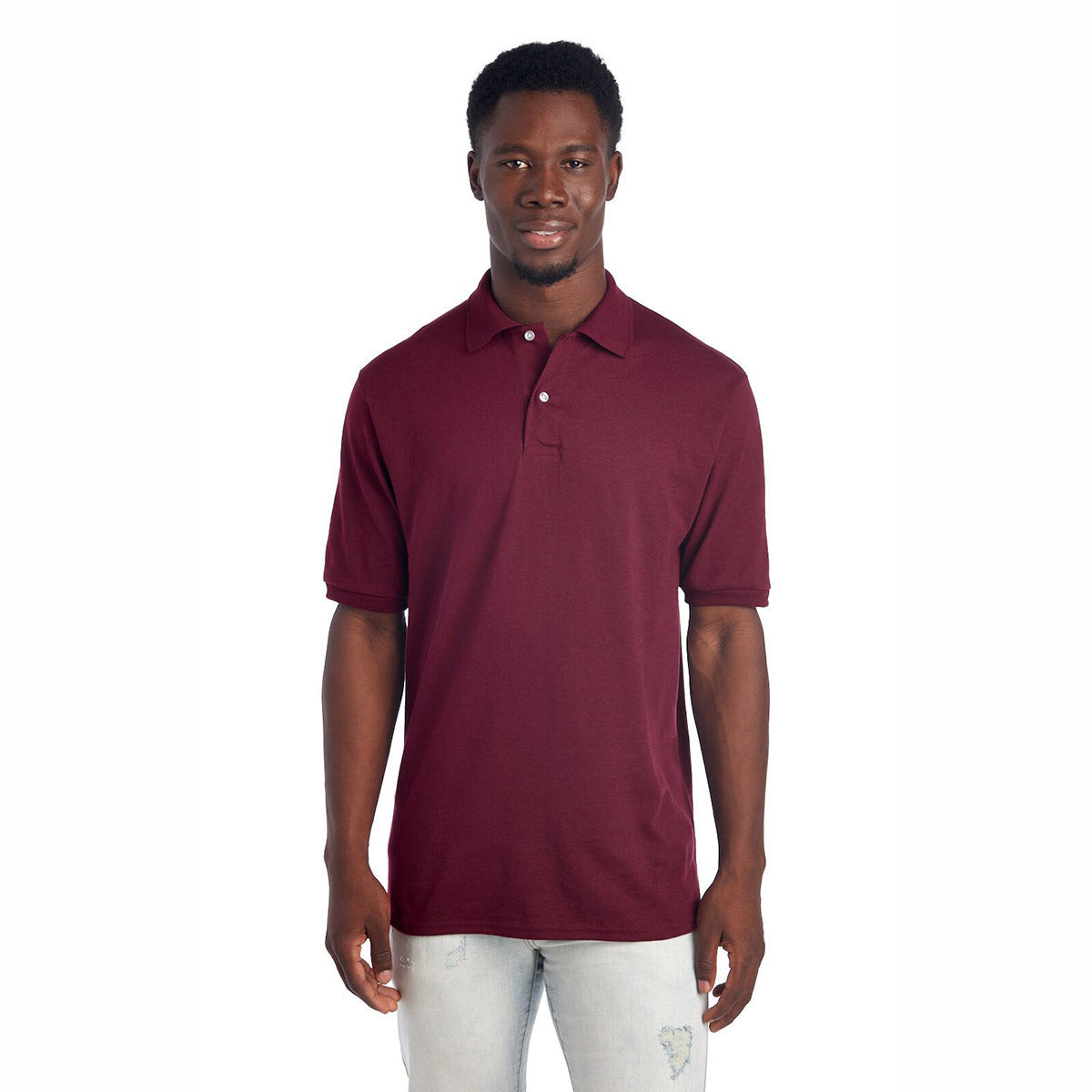 Man wearing a maroon Jerzees Dri-Power Sport Shirt.