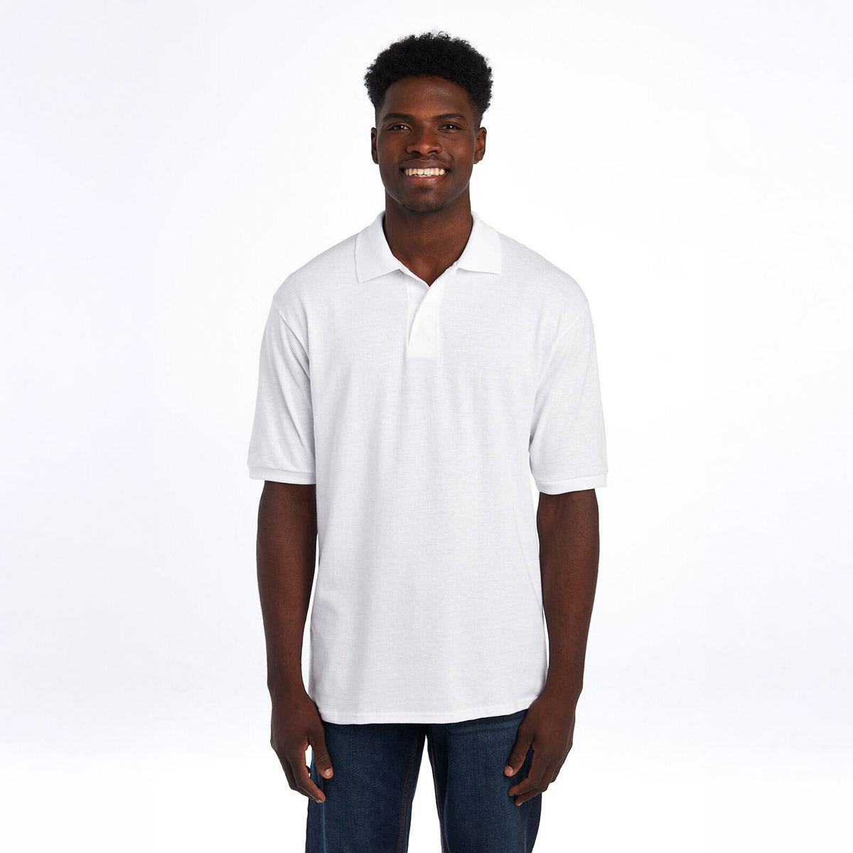 A man wearing a white Jerzees Dri-Power sport shirt against a plain white background.