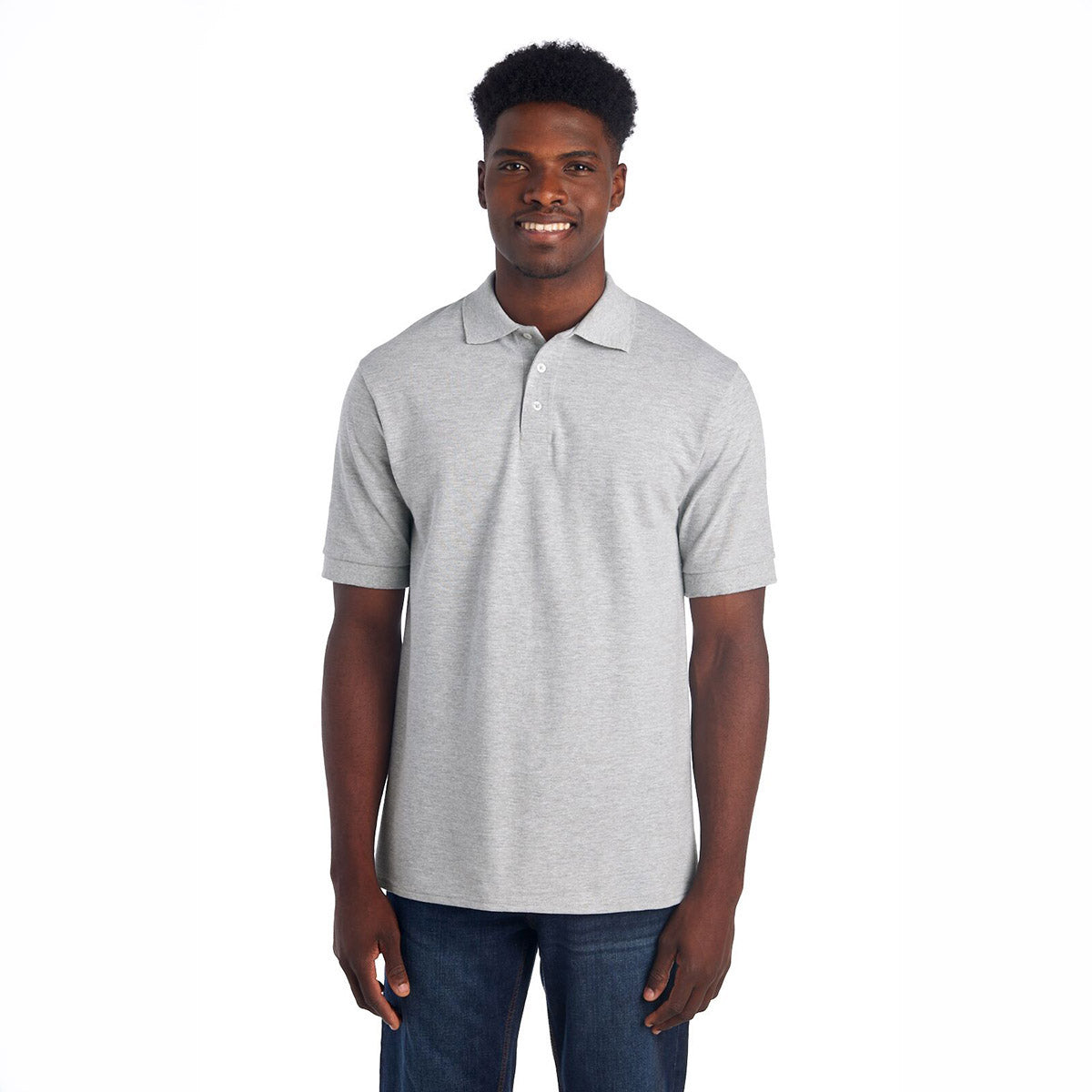 A man wearing a Jerzees Premium Ring-Spun Cotton Pique Sport Shirt in athletic heather gray.