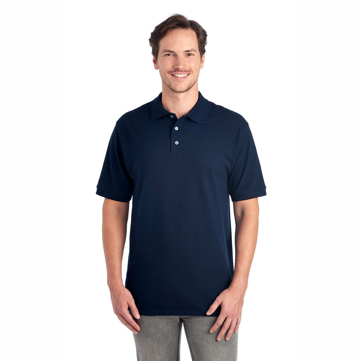 Model wearing a Jerzees Premium Ring-Spun Cotton Pique Sport Shirt in J. Navy.