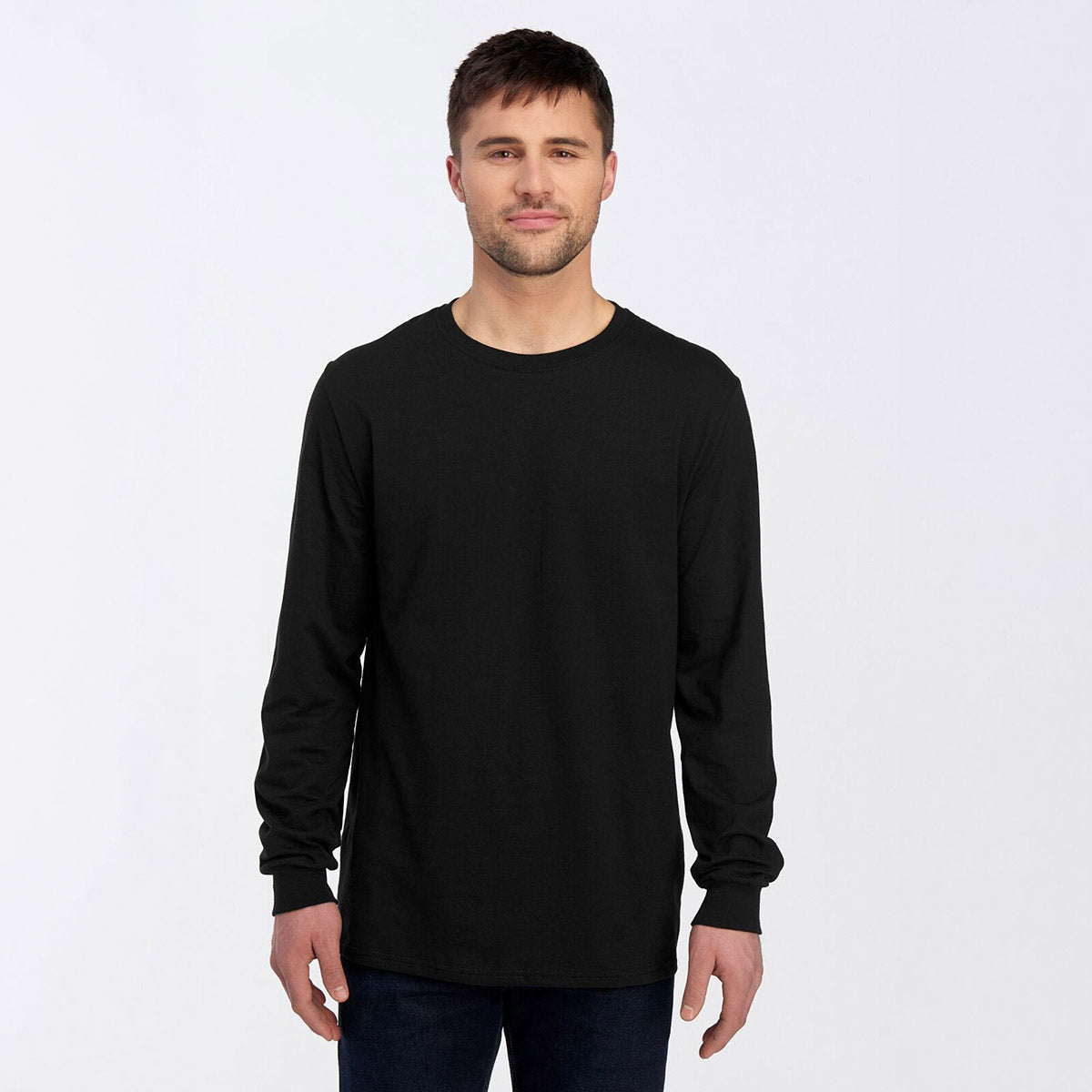 Man wearing a Jerzees Premium Blend Combed Ring-Spun unisex long-sleeve t-shirt in black ink.