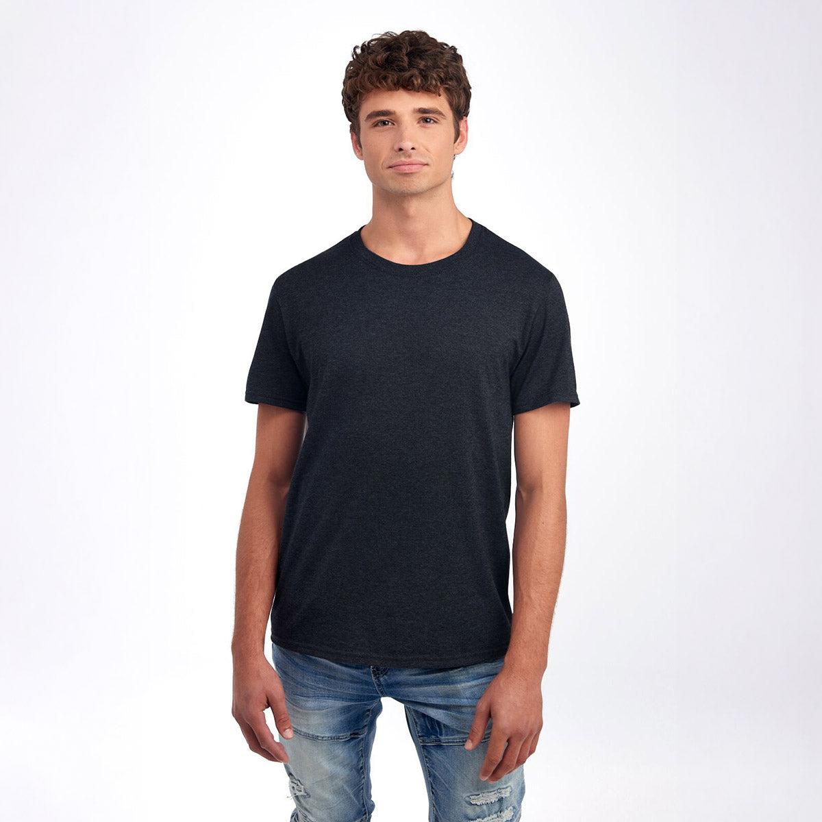 A man wearing a Jerzees Premium Blend Combed Ring-Spun Unisex T-Shirt in Black Ink Heather.