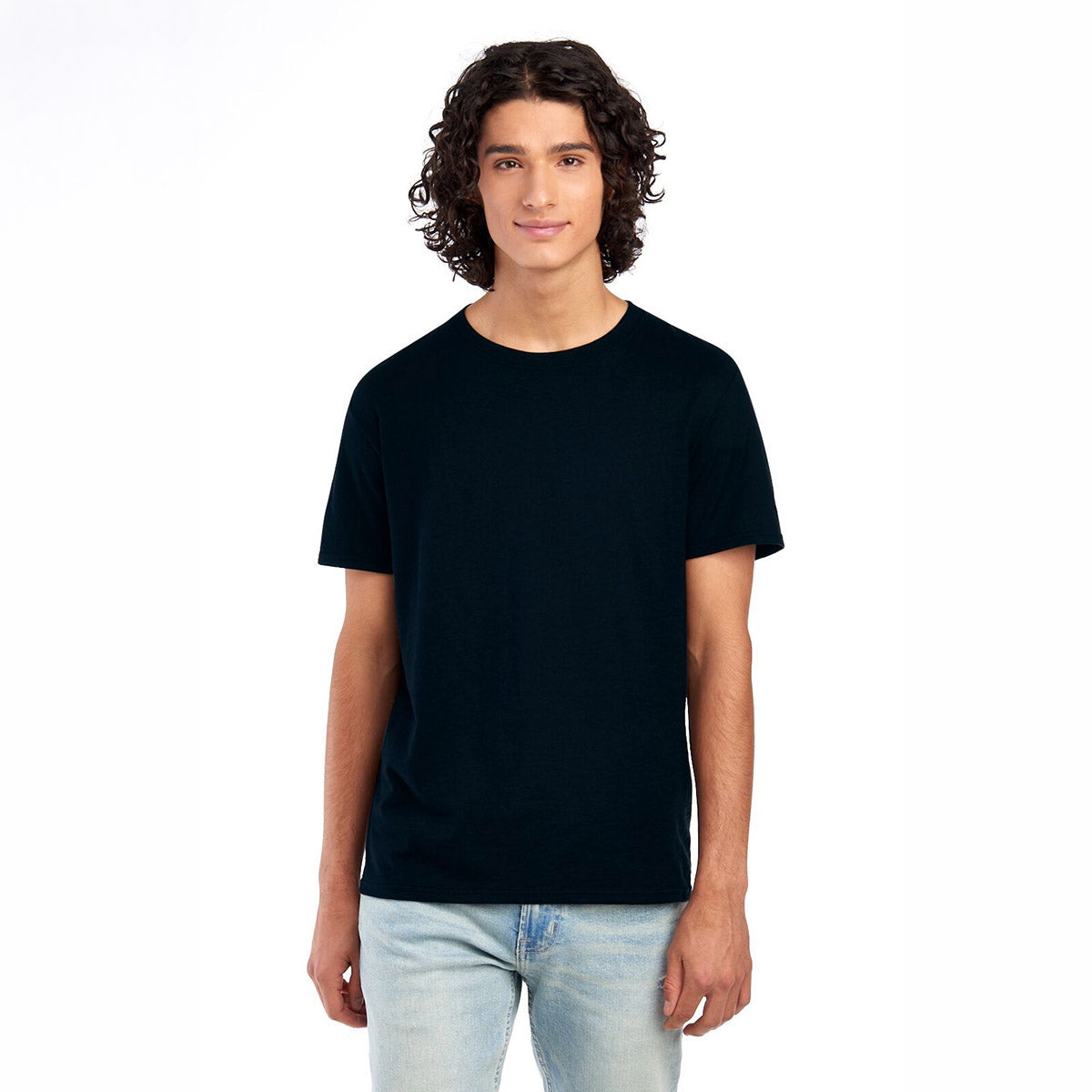 Man with curly hair wearing a black Jerzees Premium Blend Combed Ring-Spun unisex t-shirt in Black Ink.