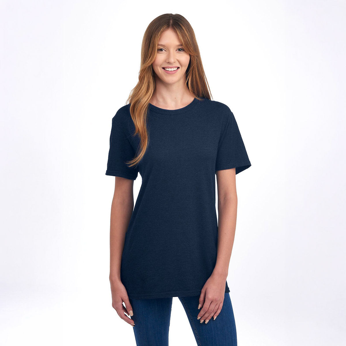 A woman wearing an Indigo Heather Jerzees Premium Blend Combed Ring-Spun Unisex T-Shirt against a white background.