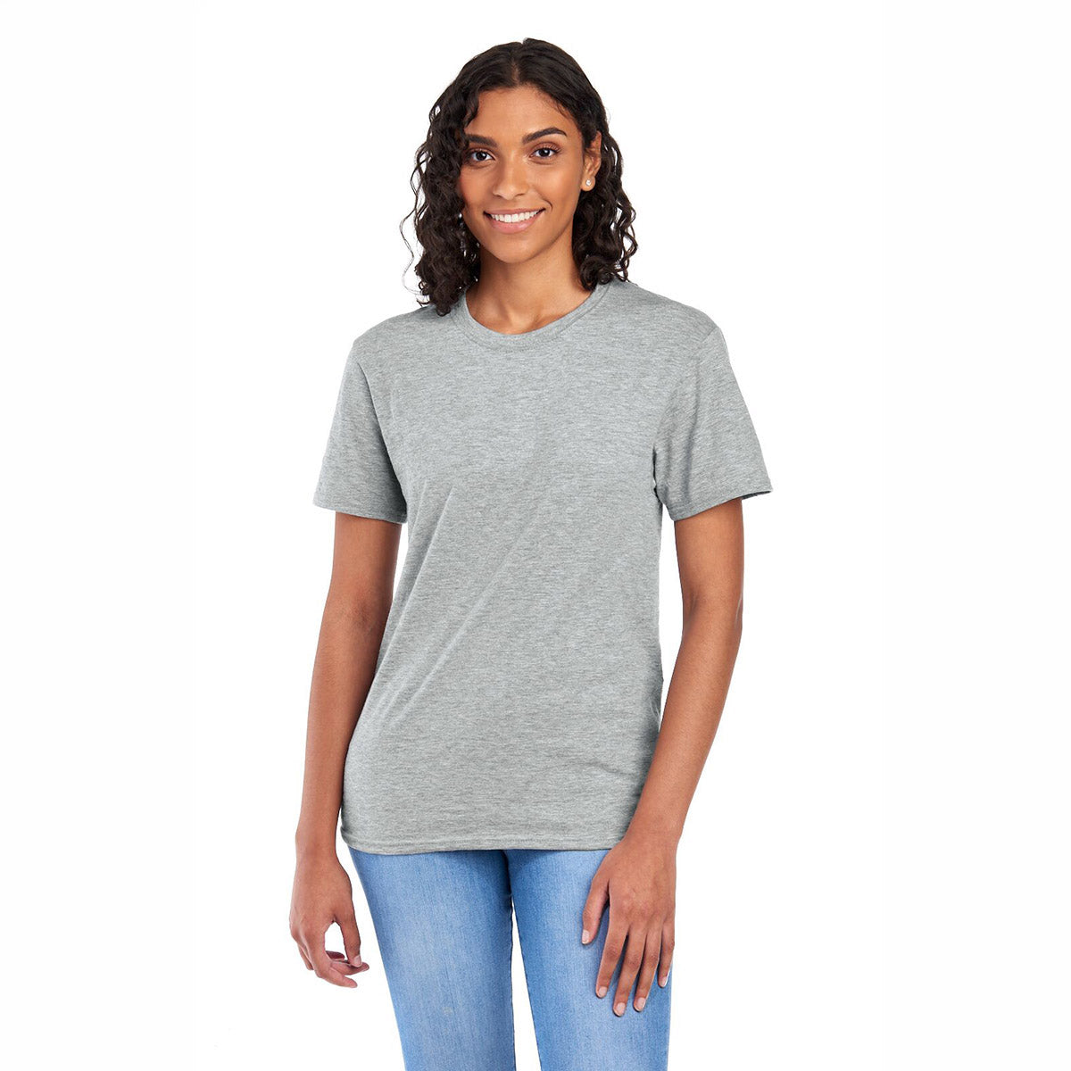 A woman wearing a Jerzees Premium Blend Combed Ring-Spun Unisex T-Shirt in oxford gray against a white background.