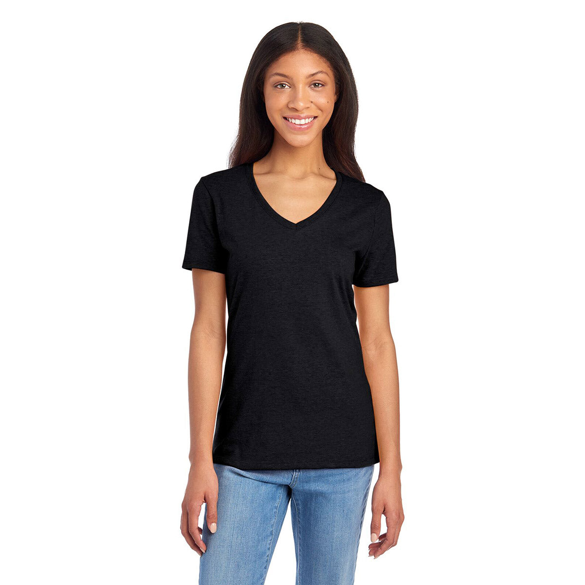 A woman wearing a black Jerzees Premium Blend Combed Ring-Spun ladies' V-neck T-shirt with blue jeans.