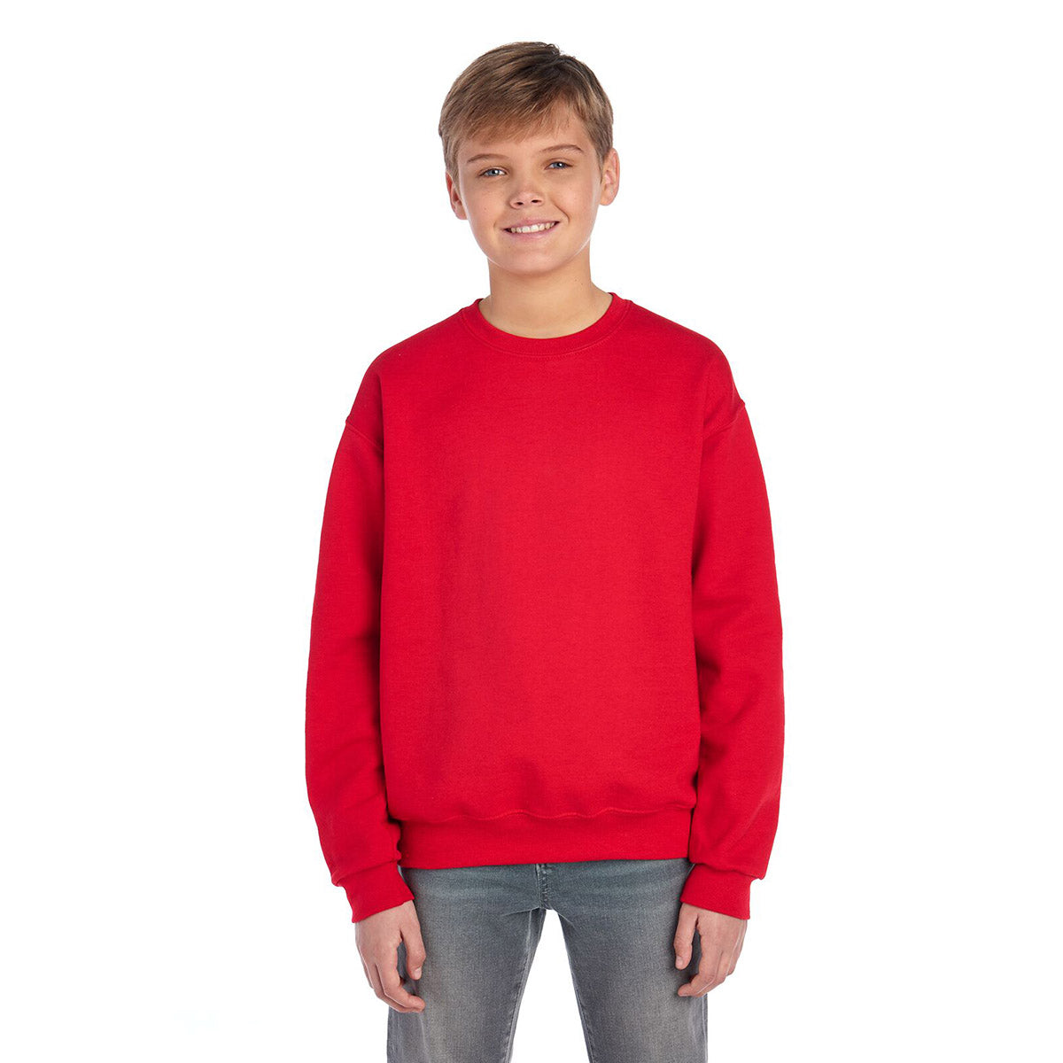 Youth model wearing a True Red Jerzees NuBlend® Youth Sweatshirt.