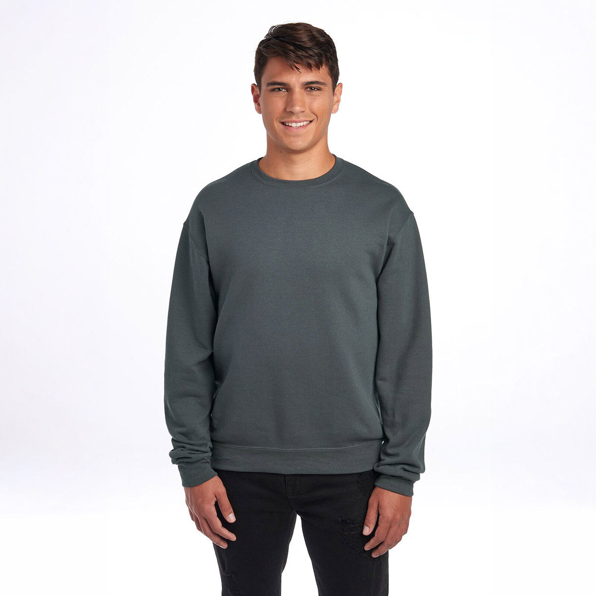 A male model wearing a Charcoal Grey Jerzees NuBlend Adult Sweatshirt against a plain white background.