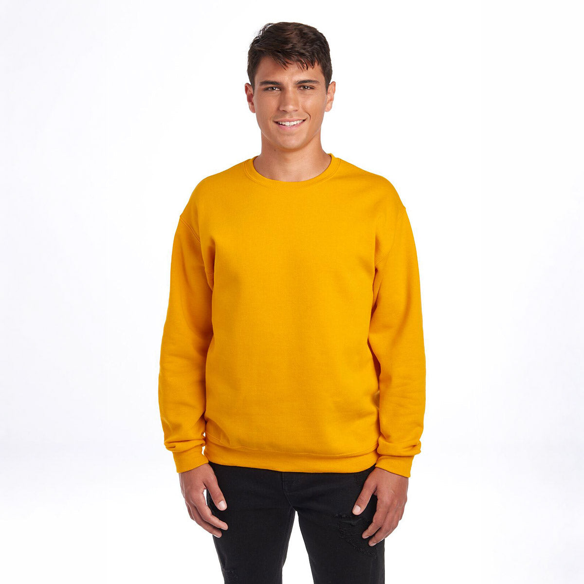 A model wearing a Jerzees NuBlend® Adult Sweatshirt in gold against a white background.