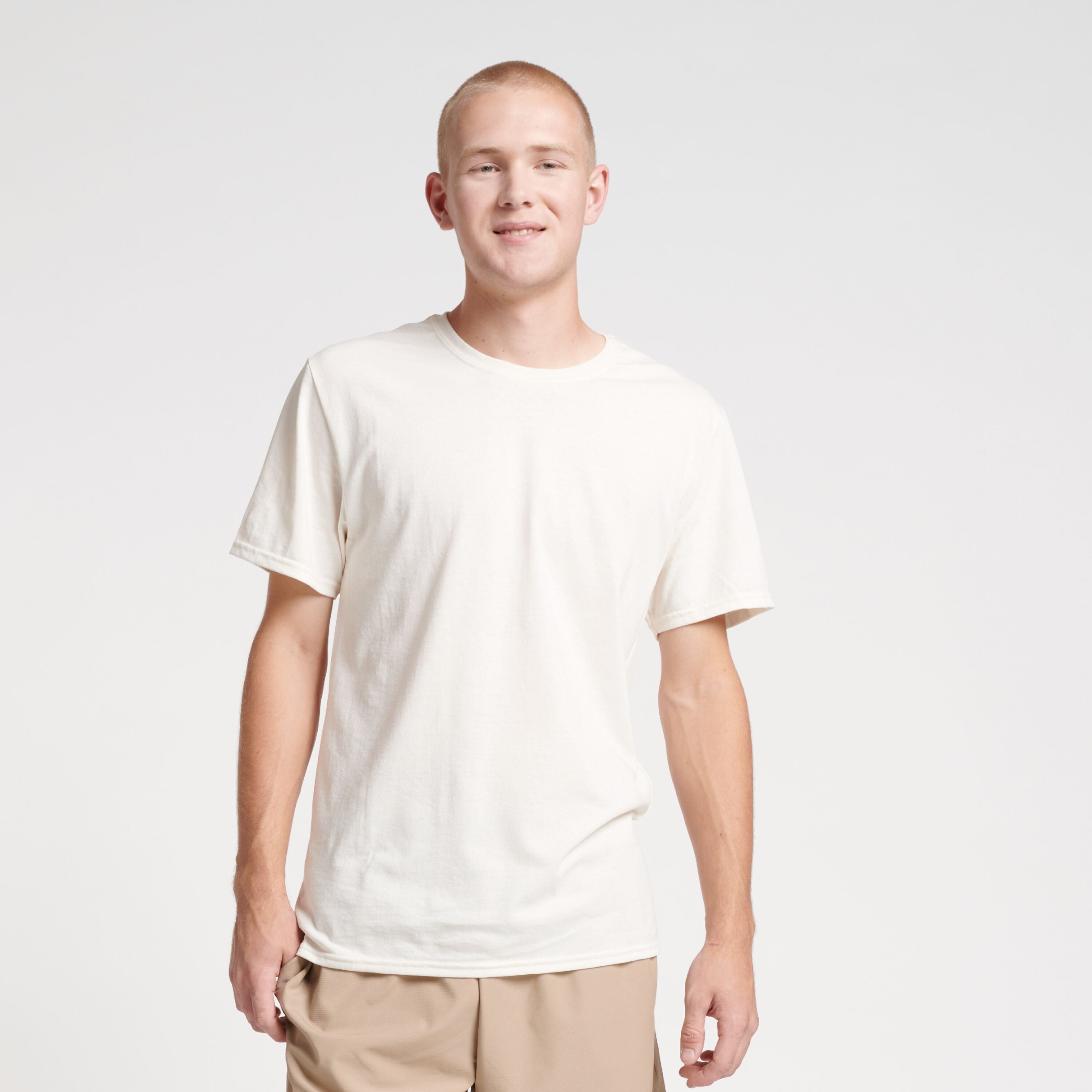 Russell Athletic DRI-POWER CVC Performance unisex short-sleeve t-shirt in vintage white on a model.