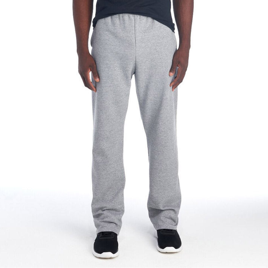 Jerzees NuBlend open-bottom sweatpants in Oxford gray worn by a man against a white background.