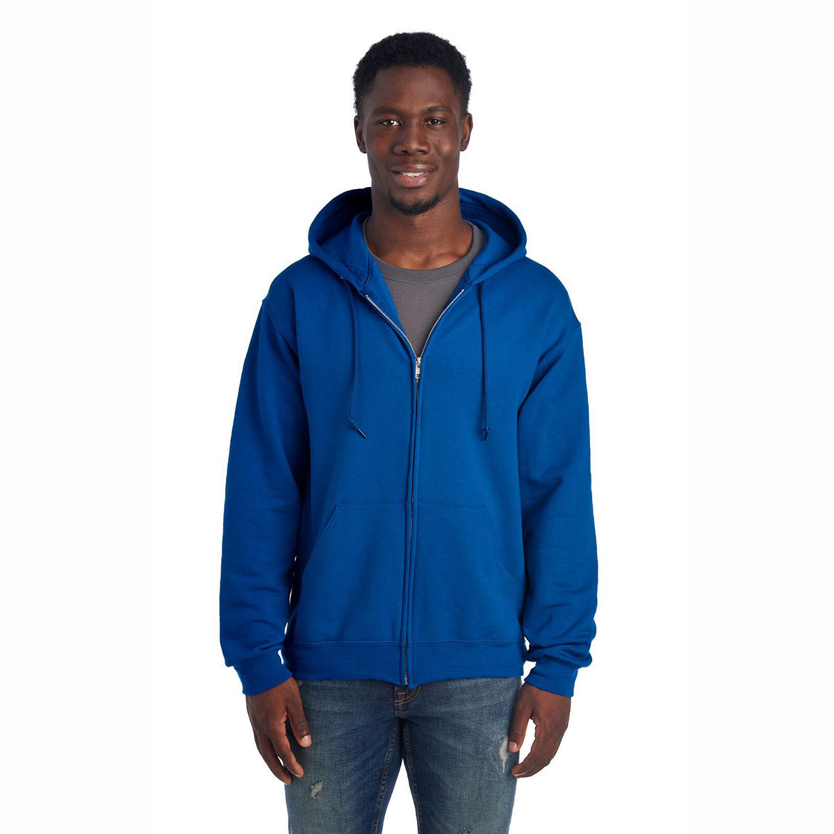 A man wearing a royal blue Jerzees NuBlend Unisex Full-Zip Hooded Sweatshirt against a white background.