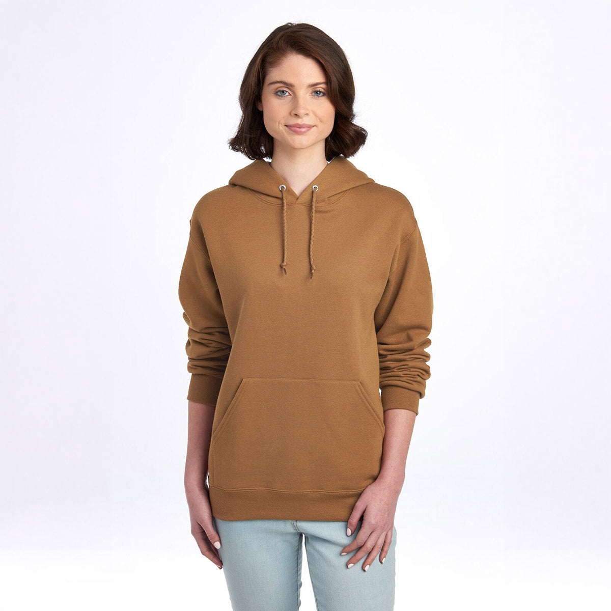 A woman wearing a Golden Pecan Jerzees NuBlend Unisex Hooded Sweatshirt against a plain white background.