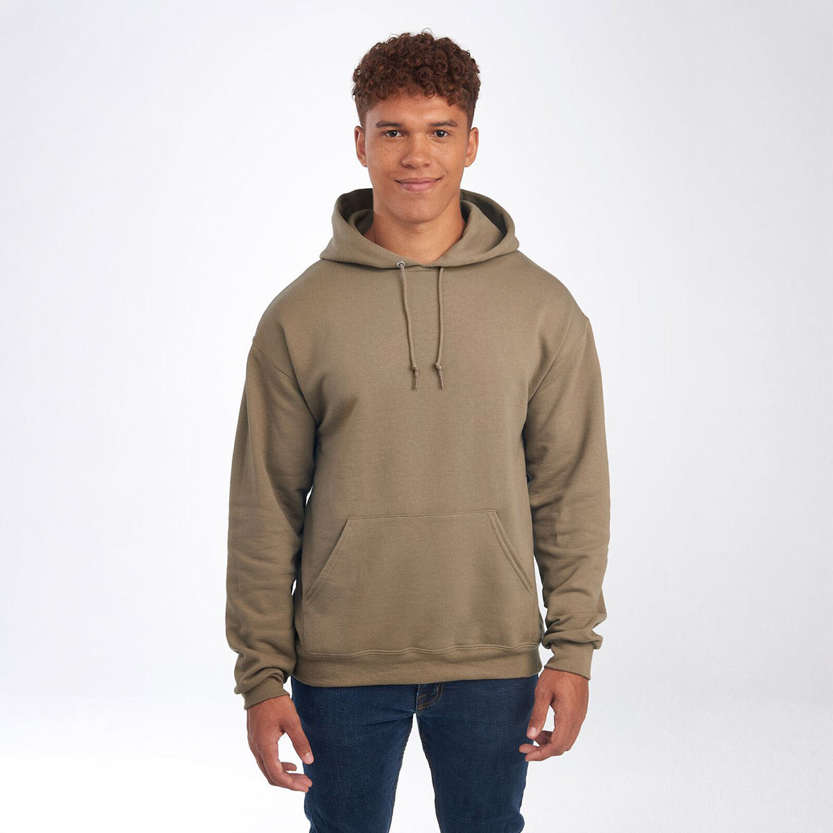 A man wearing a Safari-colored Jerzees NuBlend Unisex Hooded Sweatshirt against a white background.