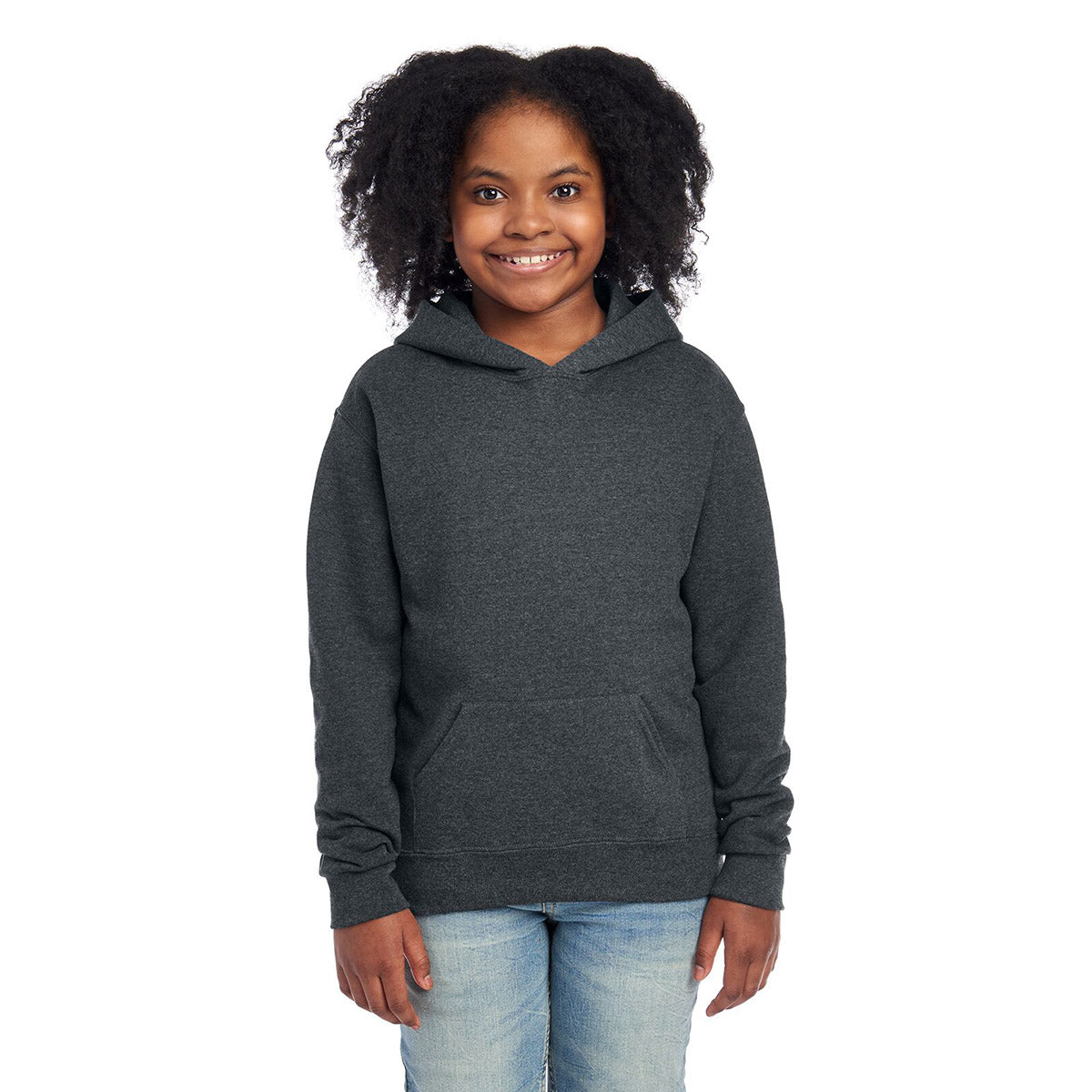 Smiling youth wearing a charcoal Black Heather Jerzees NuBlend® Youth Hooded Sweatshirt.