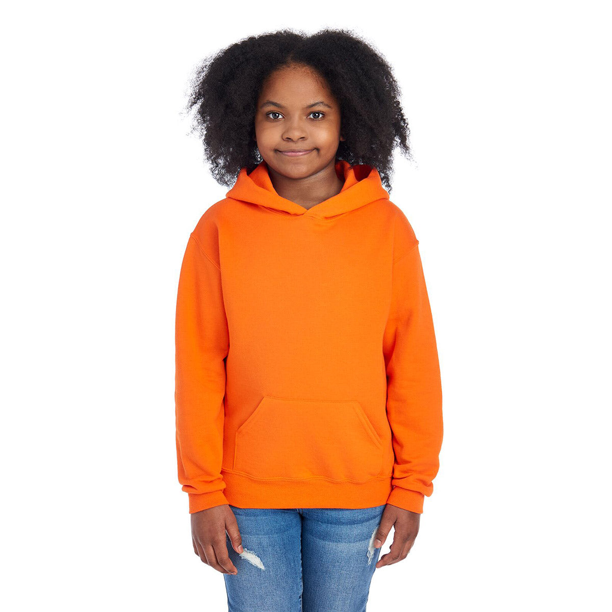 Youth girl wearing a burnt orange Jerzees NuBlend® Youth Hooded Sweatshirt against a white background.