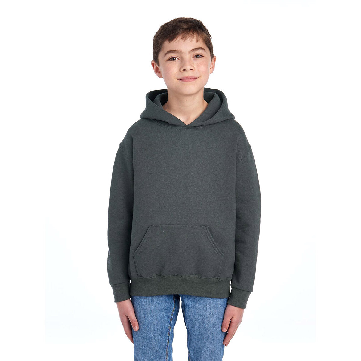 Young boy wearing a charcoal grey Jerzees NuBlend® Youth Hooded Sweatshirt.