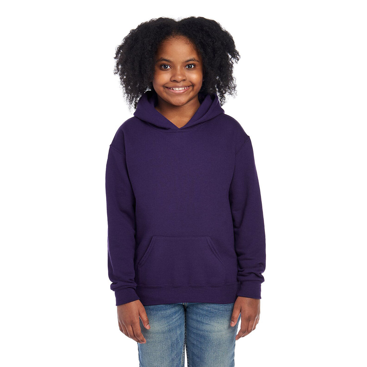 A young girl smiling while wearing a deep purple Jerzees NuBlend Youth Hooded Sweatshirt.