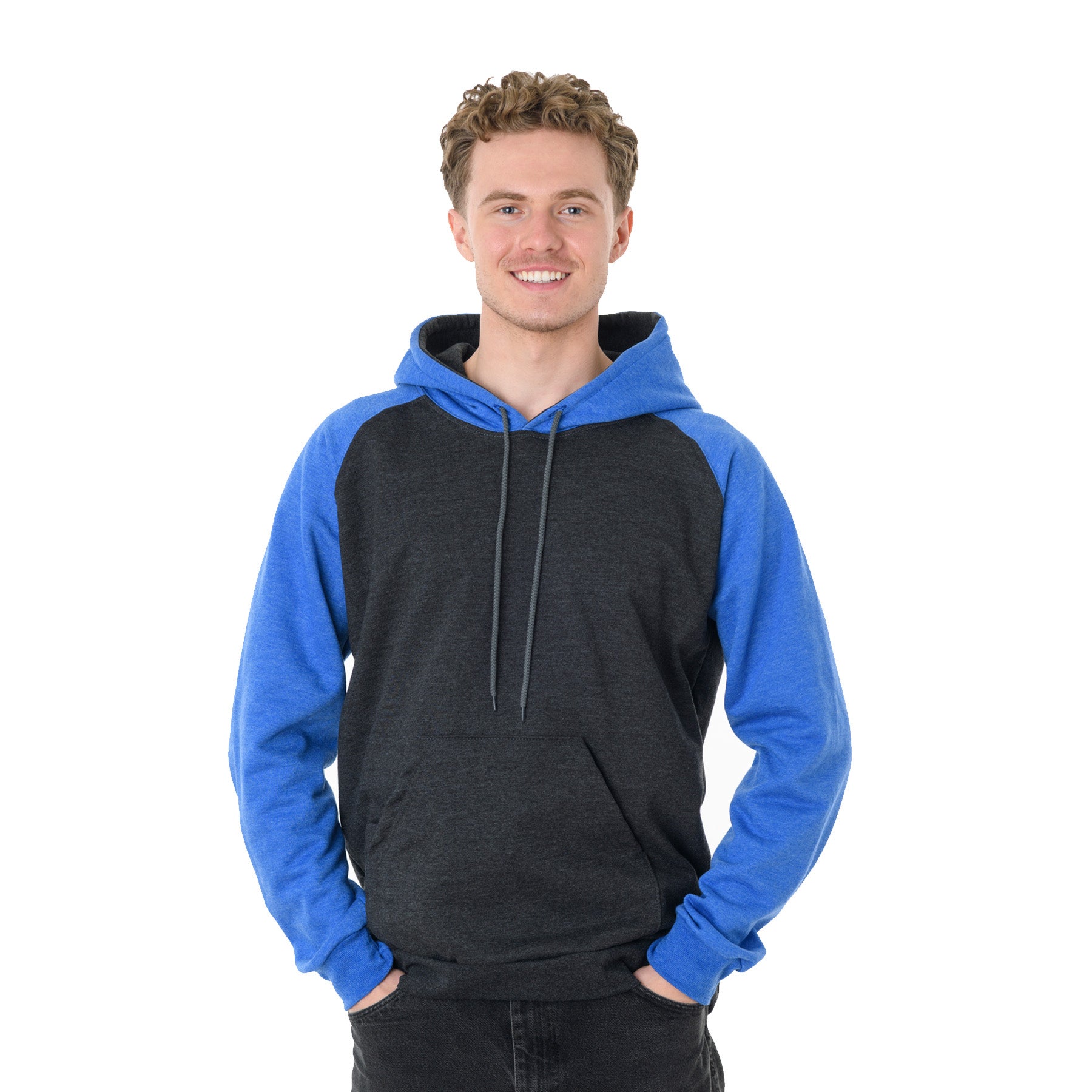 A smiling man wears a King Athletics raglan hooded sweatshirt in dark charcoal and heather royal.