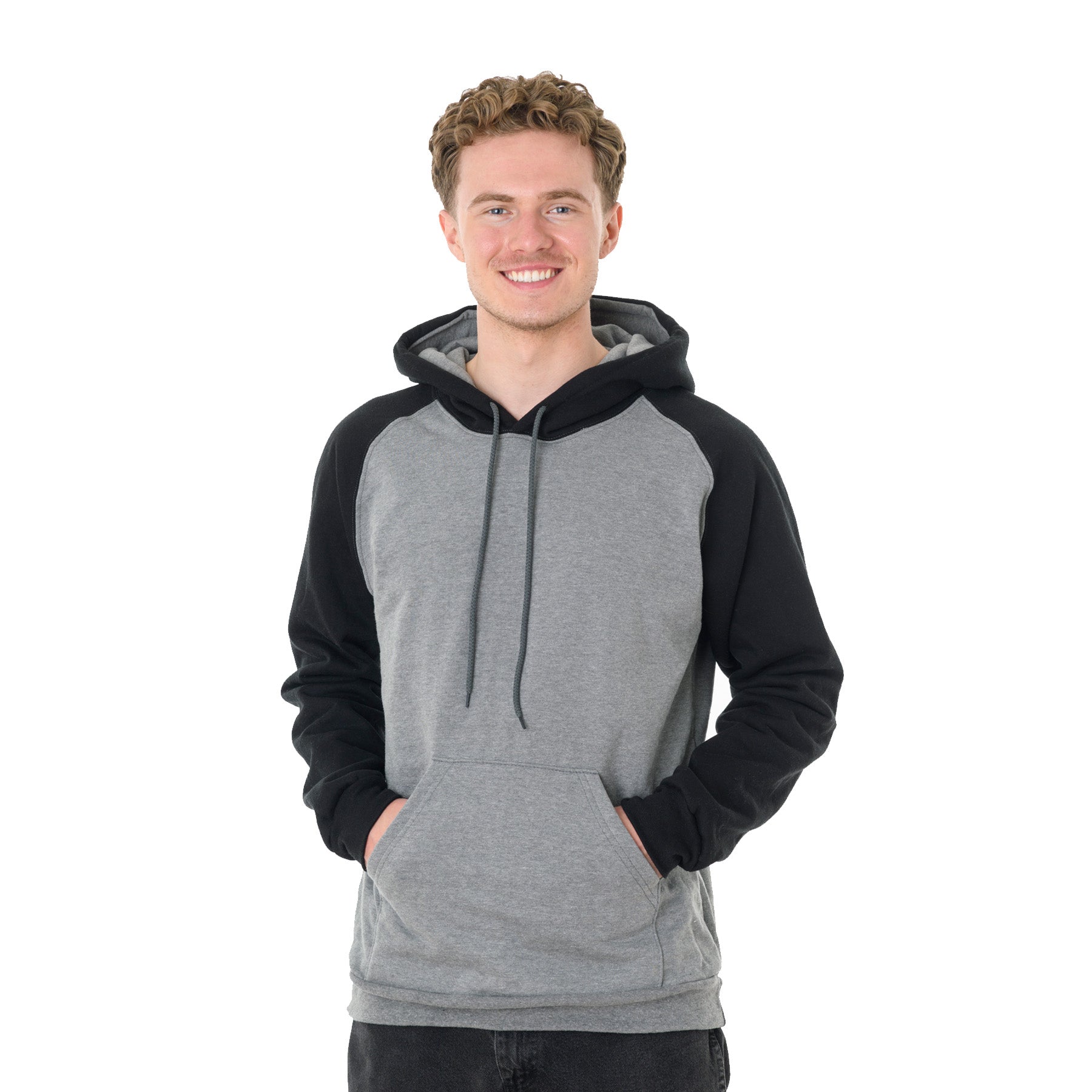 Young man wearing a grey heather and black King Athletics raglan hooded sweatshirt with a front kangaroo pocket.