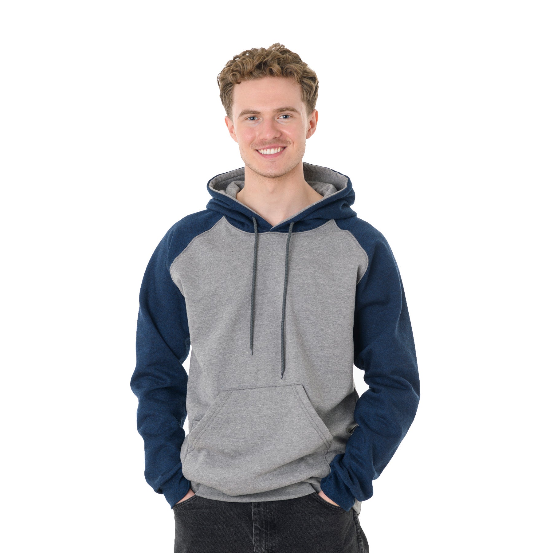 King Athletics raglan hooded sweatshirt in grey heather and heather navy, worn by a man smiling at the camera.