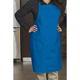 Premium Uniforms designer bib apron in royal blue with pockets worn by a person.