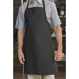 A person wearing a solid black Premium Uniforms Designer bib apron over a gray collared shirt.